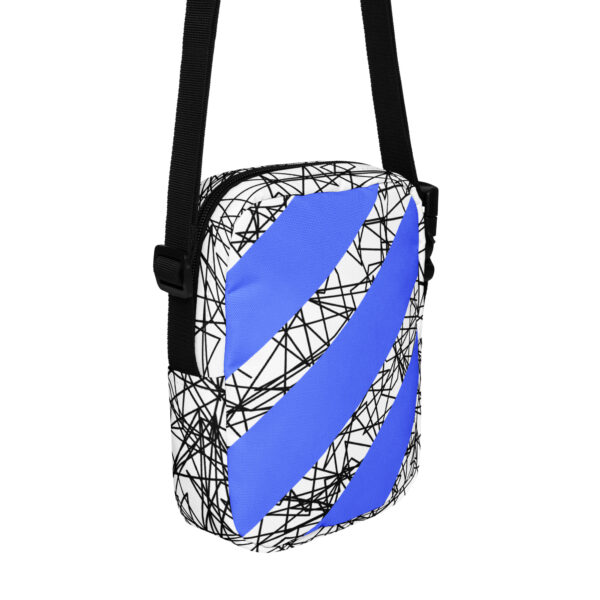 all-over-print-utility-crossbody-bag-white-back-68c92a37d11d8.jpg Blue Striped Art Crossbody Bag