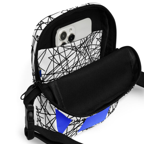 all-over-print-utility-crossbody-bag-white-product-details-3-68c92a37d1768.jpg Blue Striped Art Crossbody Bag